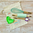 Load image into Gallery viewer, Children's baking tools including a whisk, rolling pin, and cookie cutter on a 'Mumz Little Chefs' branded bag.