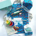 Load image into Gallery viewer, Children's cooking set with apron, hat, and utensils featuring British-themed design.