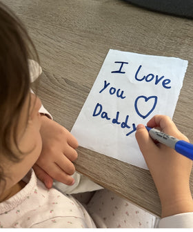 Child drawing I love you daddy