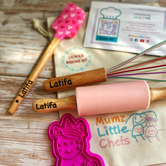 Baking tools with 'Latifa' branding on a wooden surface, including a pink rolling pin and spatula.